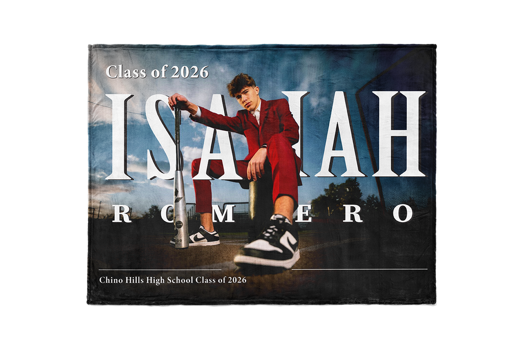 Graduation announcement with a person on a scooter, featuring the name 'Isaiah Romero' and class year '2026'.