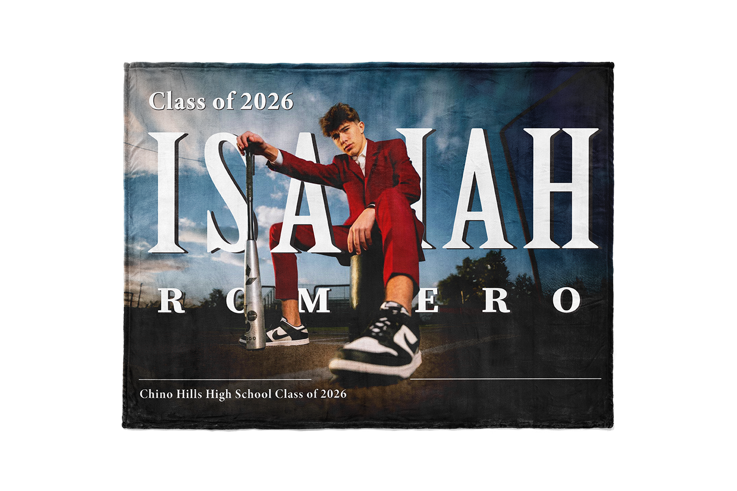 Graduation announcement with a person on a scooter, featuring the name 'Isaiah Romero' and class year '2026'.