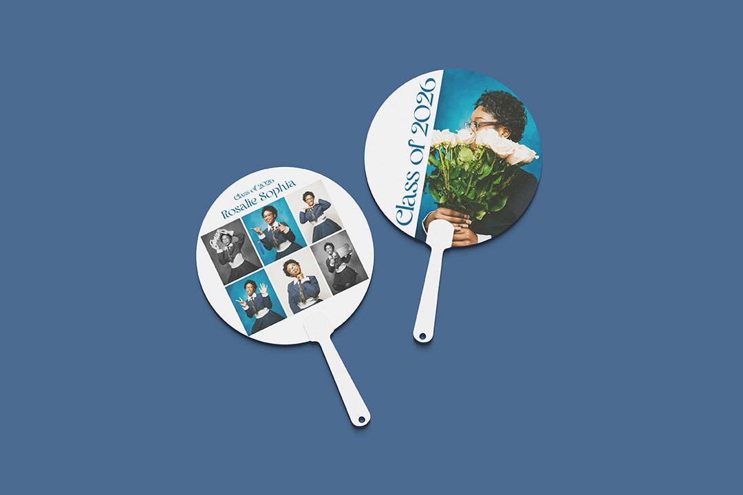 Two promotional fans with printed images on a blue background