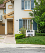 House exterior with a 'Class of 2020' sign in front yard